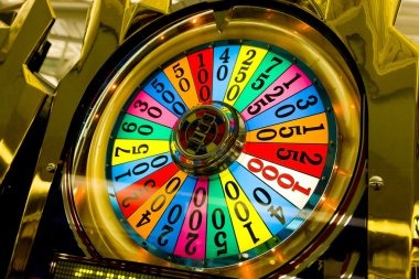 Diamond Empire slot game interface showing five reels with gemstone symbols